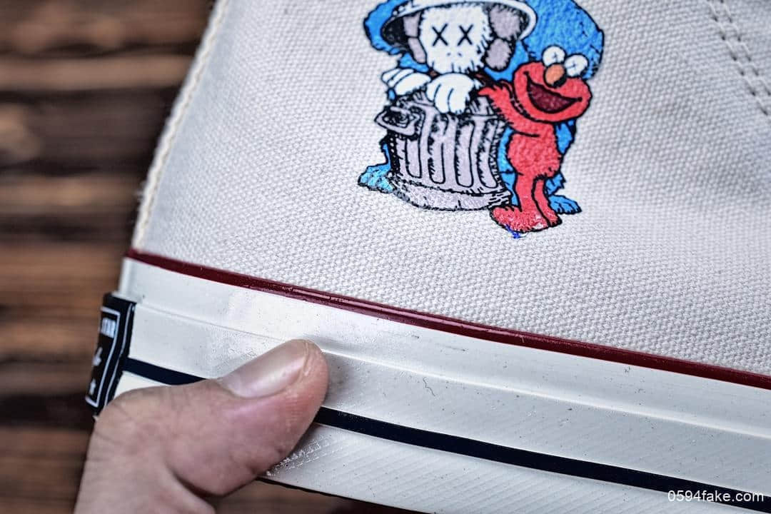 匡威联名款Sesame Street x Converse Chuck Taylor All Star 1970 HI复古三星标高帮运动硫化板鞋 货号：162053C