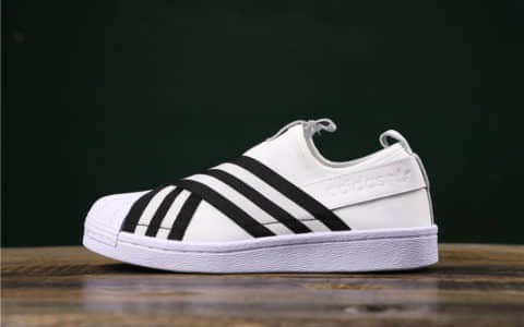 阿迪达斯Adidas SUPERSTAR SLIP ON W S贝壳头公司级交叉绑带白黑条纹时尚情侣休闲板鞋 货号：AC8581