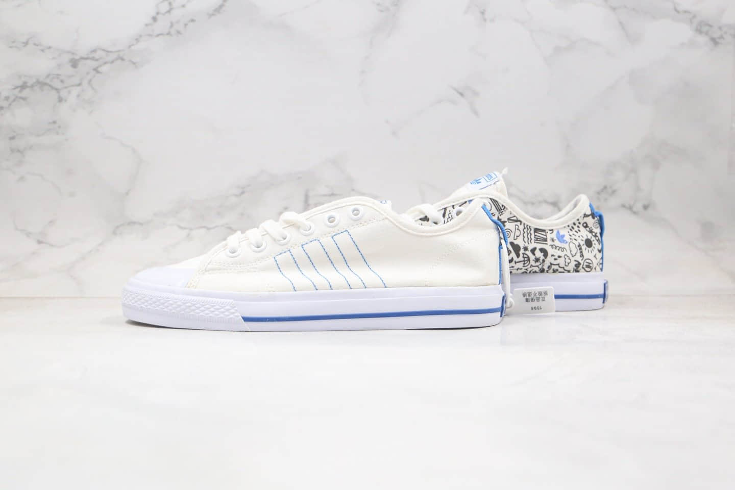阿迪达斯Adidas Nizza纯原版本校园板鞋白蓝色涂鸦印花原盒原标原鞋开模 货号：FY3090