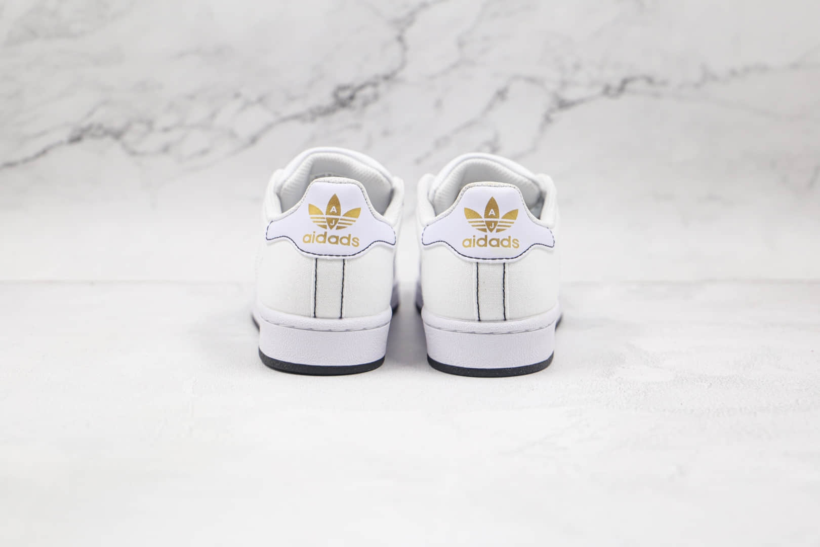 阿迪达斯adidas Originals Superstars纯原版本三叶草贝壳头帆布板鞋白黑缝线区别市面通货 货号：AJ7924