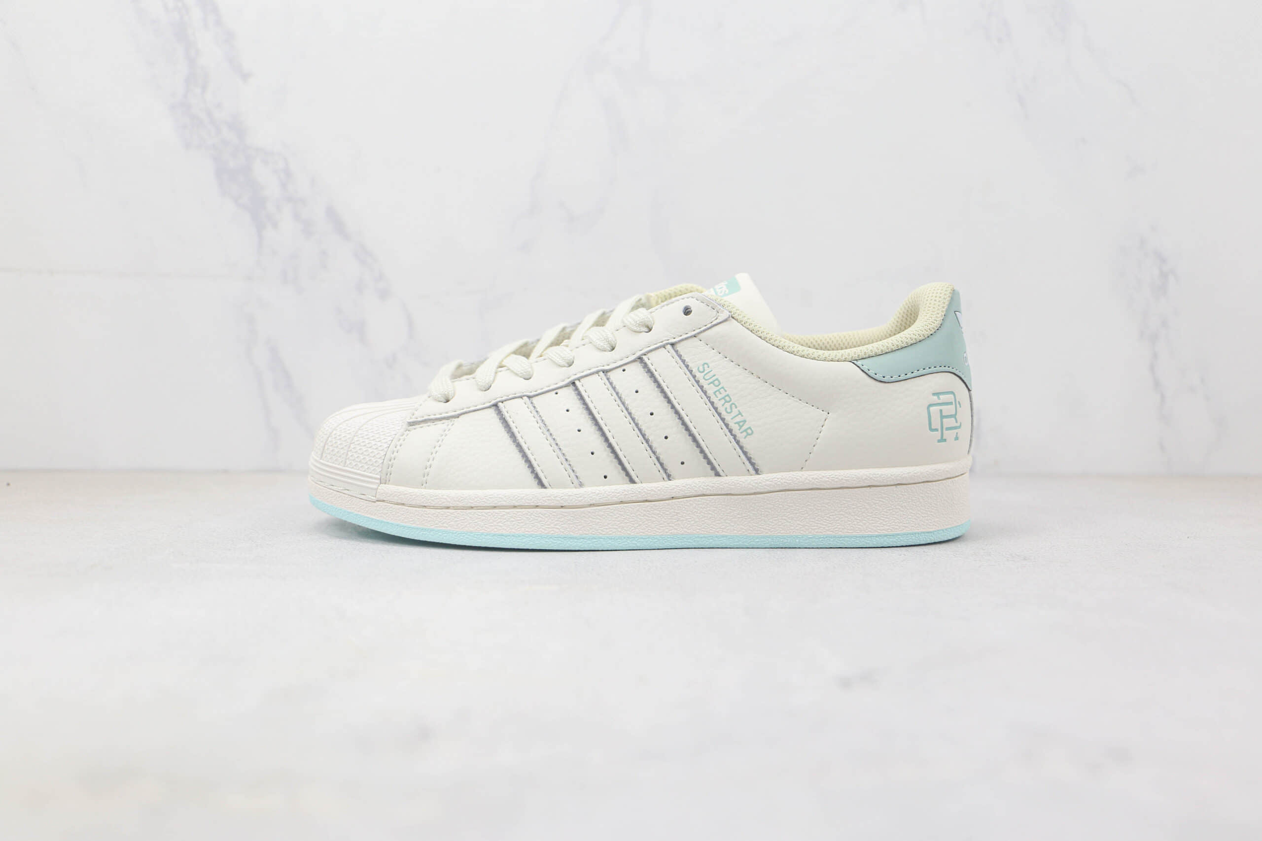 阿迪达斯Adidas Originals SUPERSTAR W纯原版本贝壳头白蓝色板鞋 阿迪达斯三叶草贝壳头系列 货号：HR0469