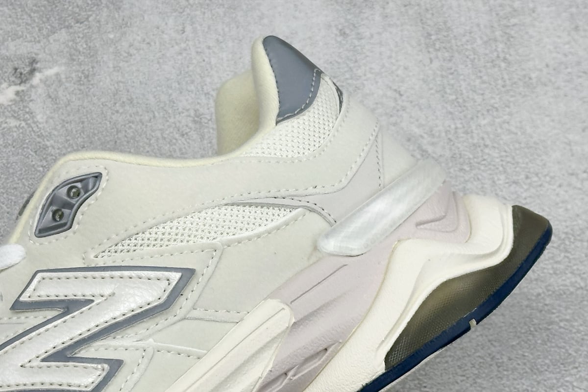 新百伦 New Balance 9060系列 新百伦 复古休闲运动慢跑鞋 鞋面大身由空间双格及磨砂鞋面拼接而生 采用大面积网眼以及麂皮材质覆盖鞋身 还原经典气质 搭载ABZORB避震科技 由泡沫聚酯制成 上脚可以有效减少由鞋底反弹对身体及双腿的冲击力-实拍图9