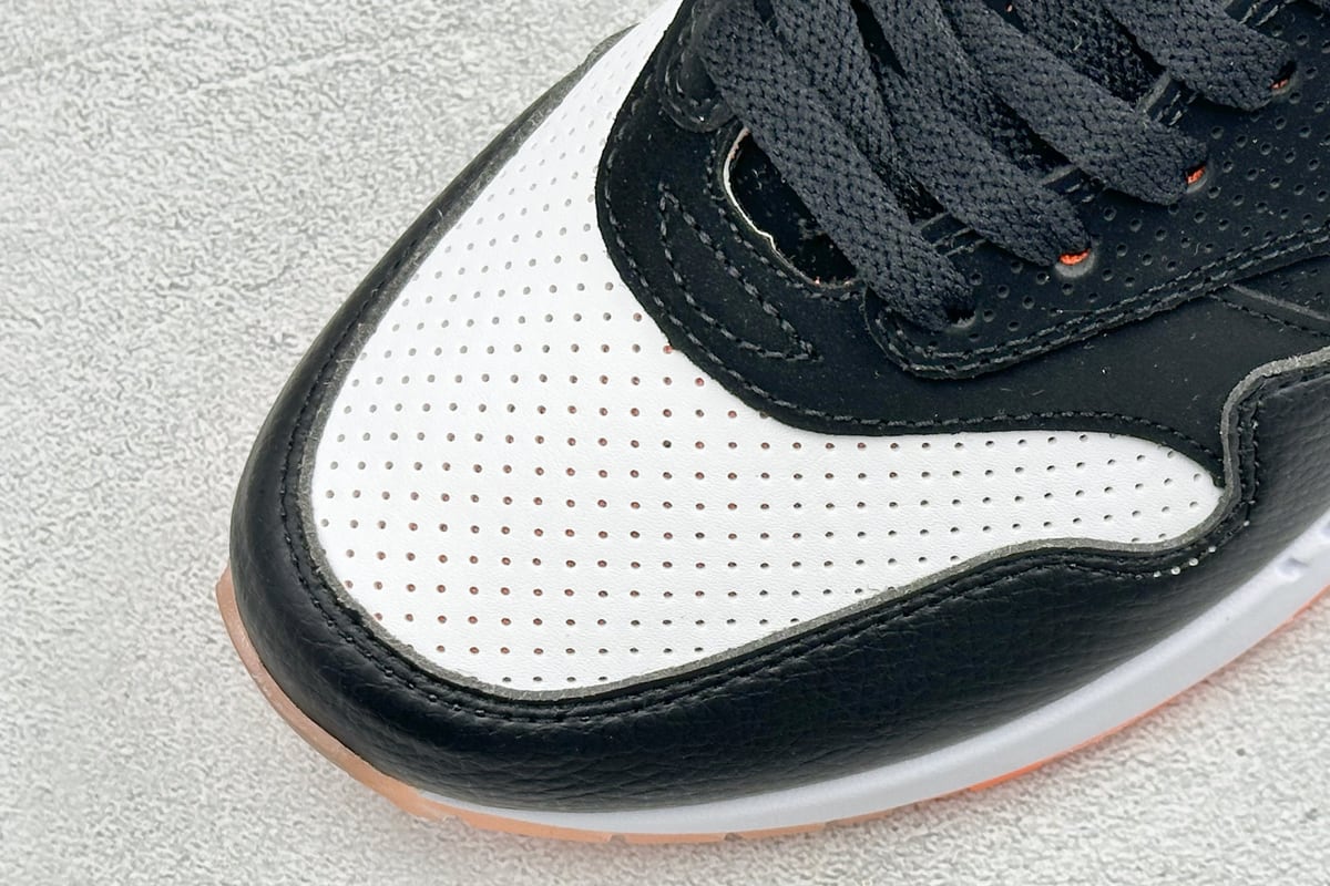 耐克 Nike Air Max 1 初代复古气垫慢跑鞋 由Tinker 黑白橙 鞋标实拍图