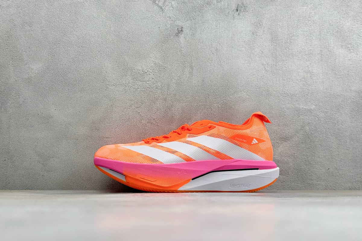 阿迪达斯 Adidas ZYRION PRO 舒适贴合防滑耐磨透气回弹跑步鞋 橙粉 正面实拍图