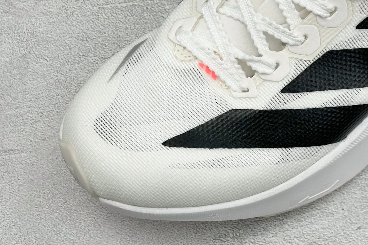 阿迪达斯 Adidas ZYRION PRO 舒适贴合防滑耐磨透气回弹跑步鞋 白黑 鞋标实拍图