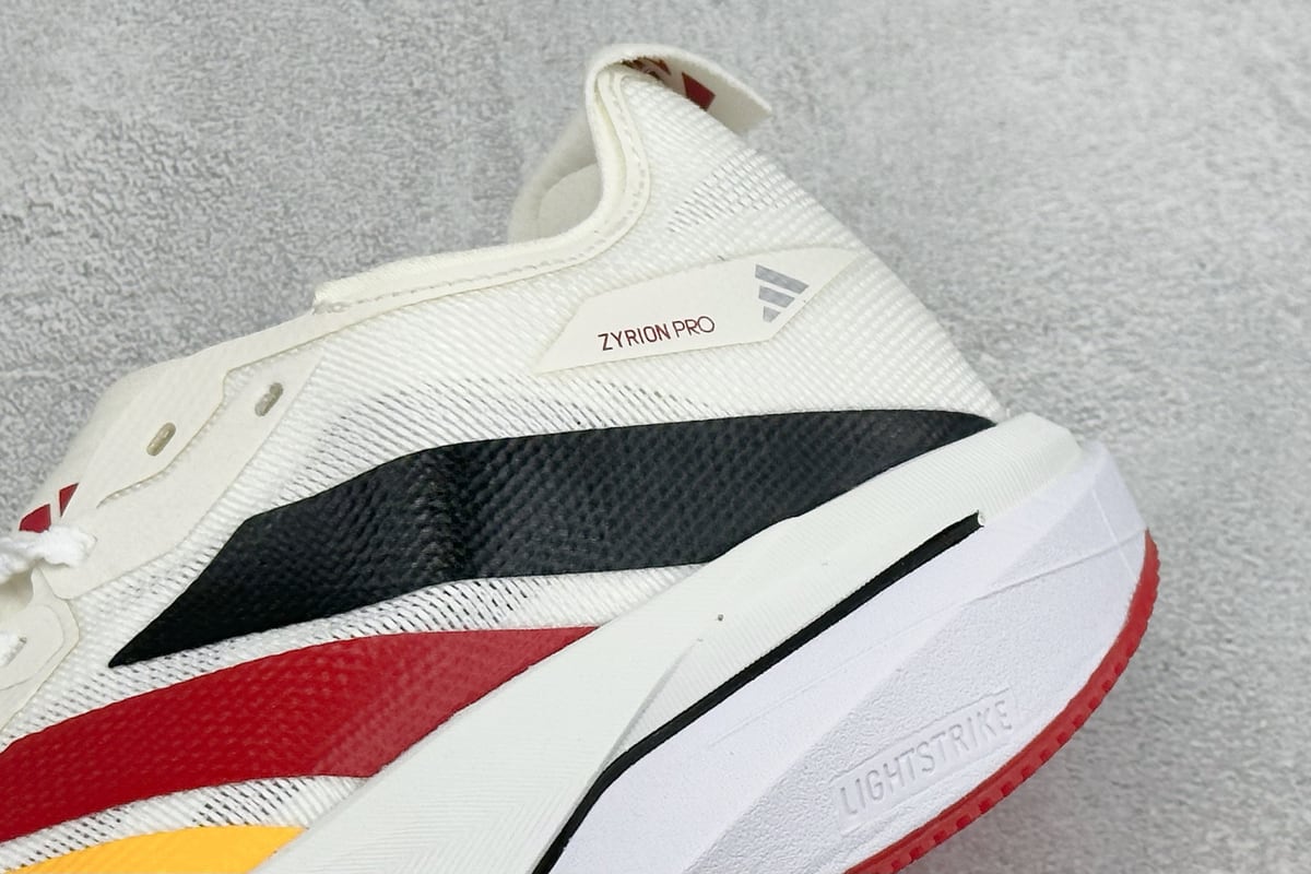阿迪达斯 Adidas ZYRION PRO 舒适贴合防滑耐磨透气回弹跑步鞋 白红黄 细节实拍图